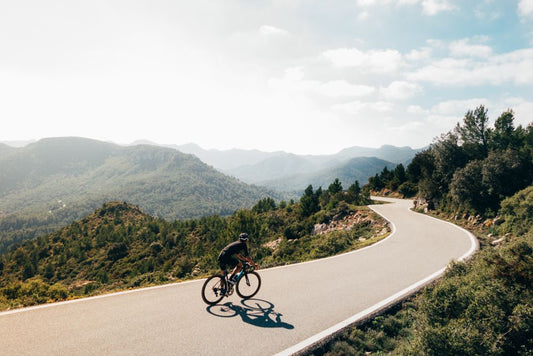 cyclist on mountain road